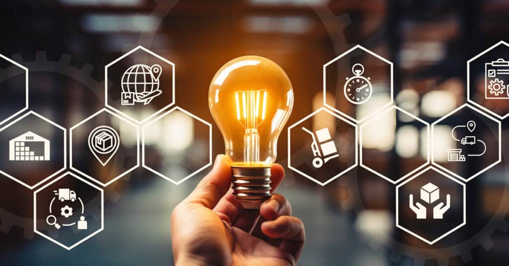 Innovative business solutions represented by a glowing light bulb with digital icons for logistics, supply chain, and technology management.