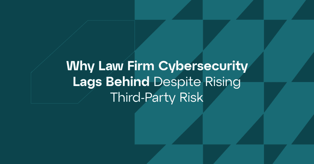 Law firm professionals reviewing third-party vendor risk management strategy on laptops